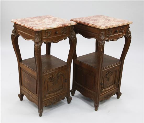 A pair of French carved oak bedside cabinets, W.1ft 4in.